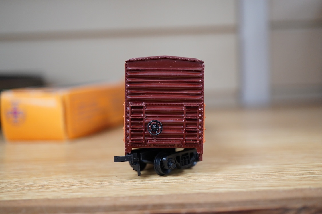 A quantity of US outline HO railway by Athearn, Bachmann, etc. including three locomotives; a Union Pacific Bo-Bo diesel, 1468, a Santa Fe Bo-Bo diesel, 5707, and a Santa Fe 0-4-0 tender engine, together with a 12-wheel